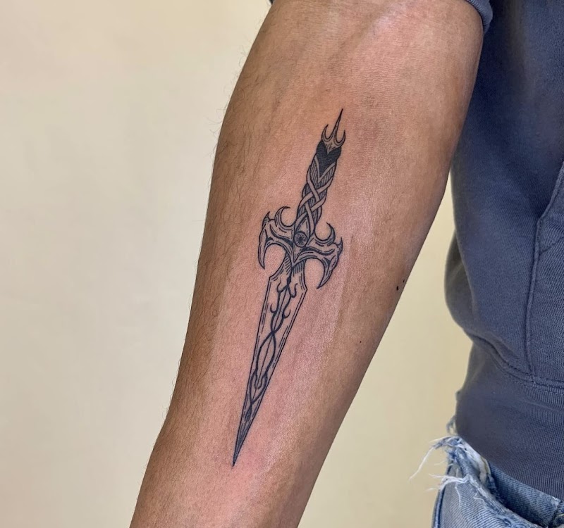 Singulier Tattoo